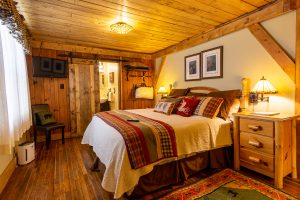 a gorgeous hotel room at the Hemlock Inn with real wooden floors and ceilings 